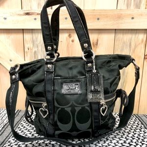 All black Coach purse from the poppy collection.